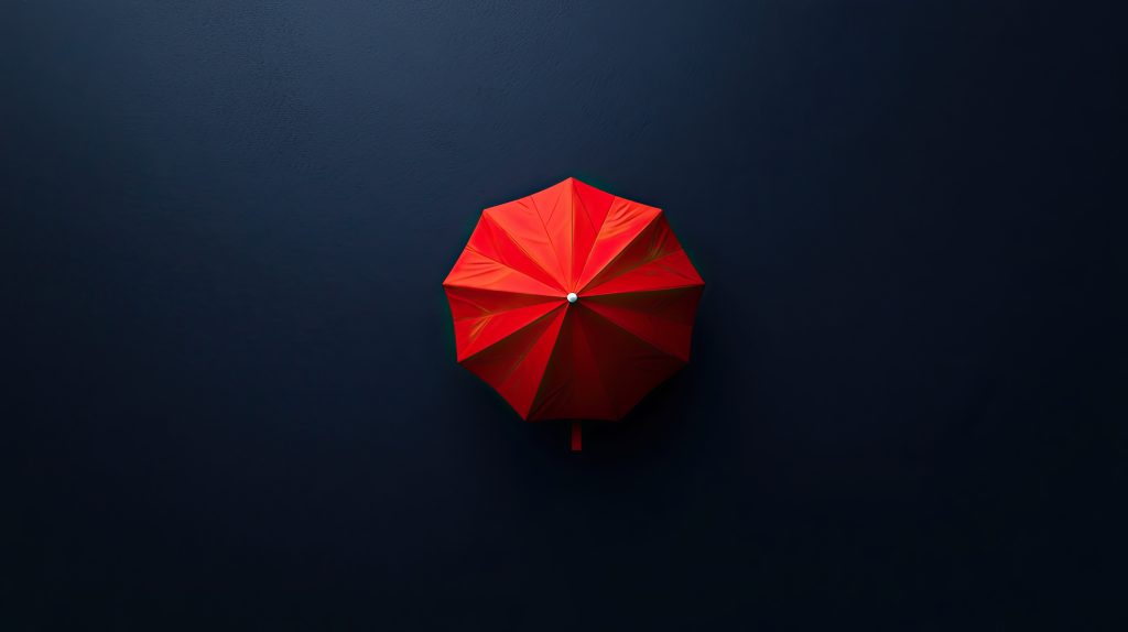 Umbrella in a storm representing excess of loss reinsurance protection above a retention